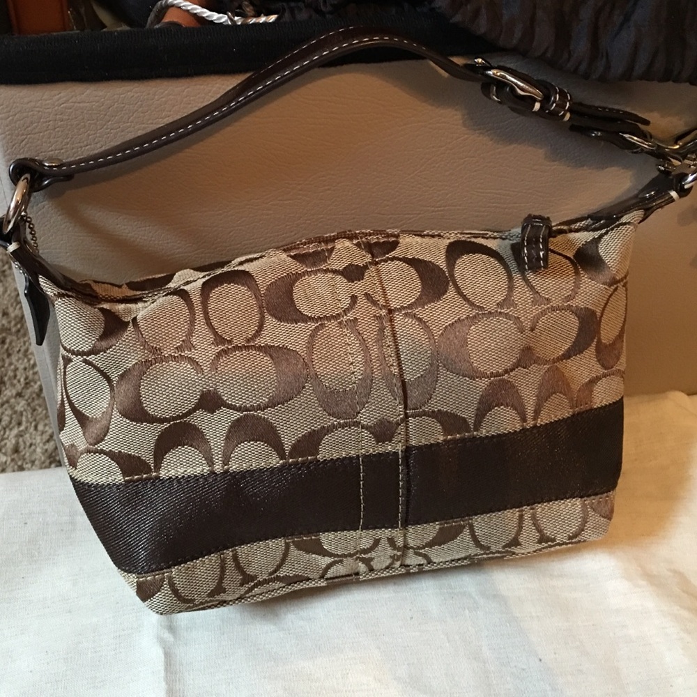 Small coach purse.